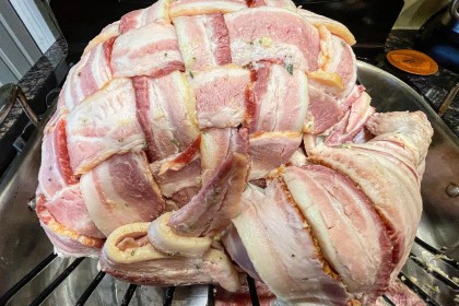 Raw bacon wrapped thanksgiving turkey