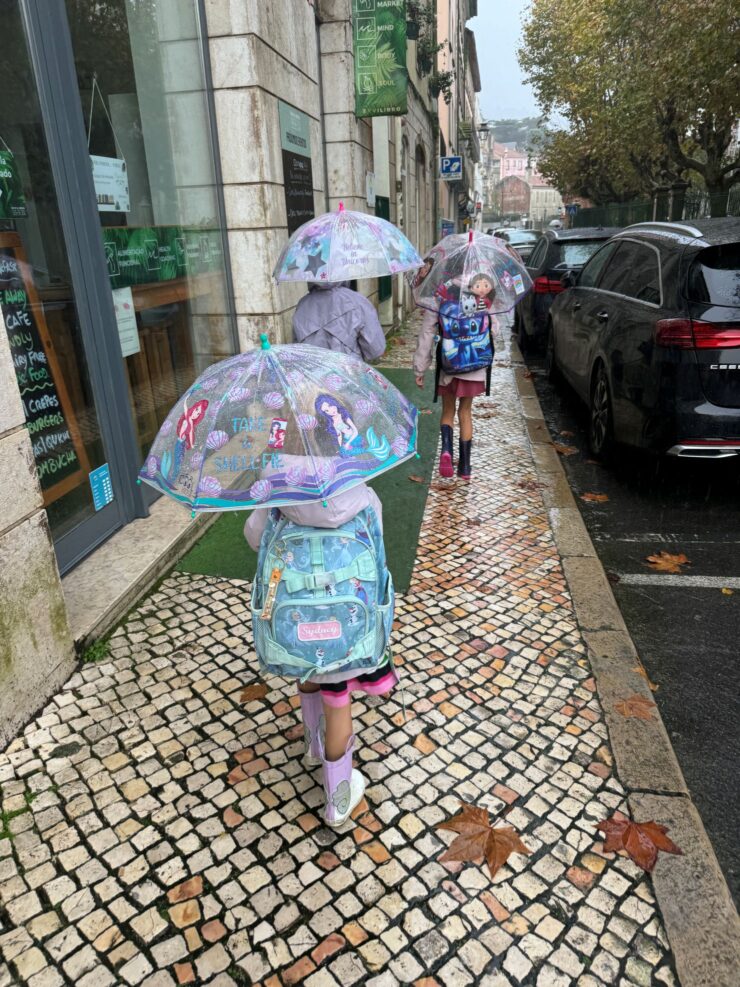 Kids walking on a rainy day in Sintra Portugal