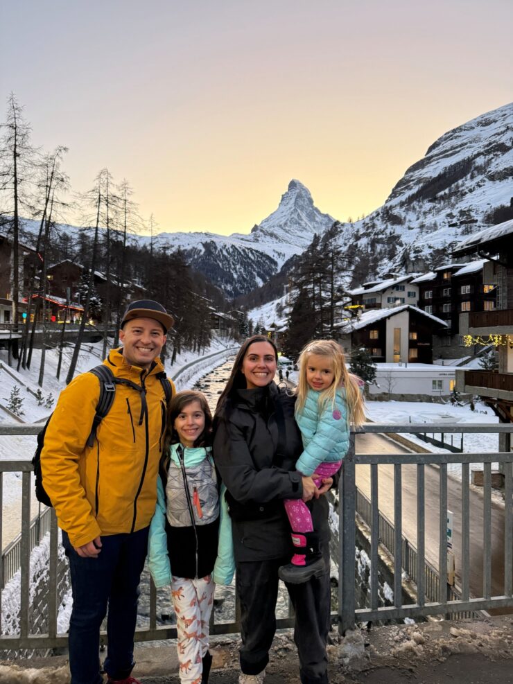 Family photo with Matterhorn on the river bridge in Zermatt Switzerland