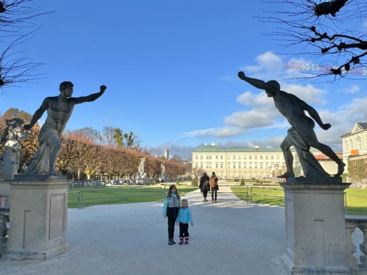 Winter family fun in Salzburg visiting the Mirabell gardens, a Sound of Music scene location in Salzburg, Austria