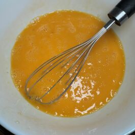 Scrambling eggs for Tortilla Espanola