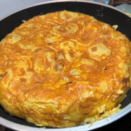 After the flipping the Tortilla over, Tortilla Espanola from tapas bars to your home