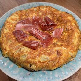 Homemade Tortilla Espanola topped with Jamon Iberico to finish the recipe