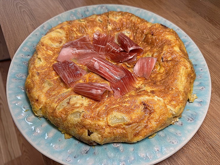 Homemade Tortilla Espanola topped with Jamon Iberico to finish the recipe