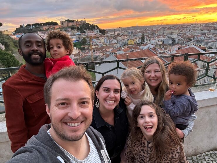 Family selfie from 8 Colina, a brewery taproom in the Graca neighborhood of Lisbon, Portugal with a family friendly setting.