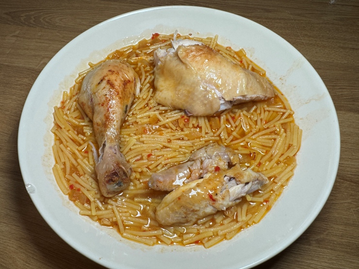 Spanish chicken noodle stew plated with Roast chicken and Fideo noodles and Fideo noodles, Sopa de Pollo con Fideos