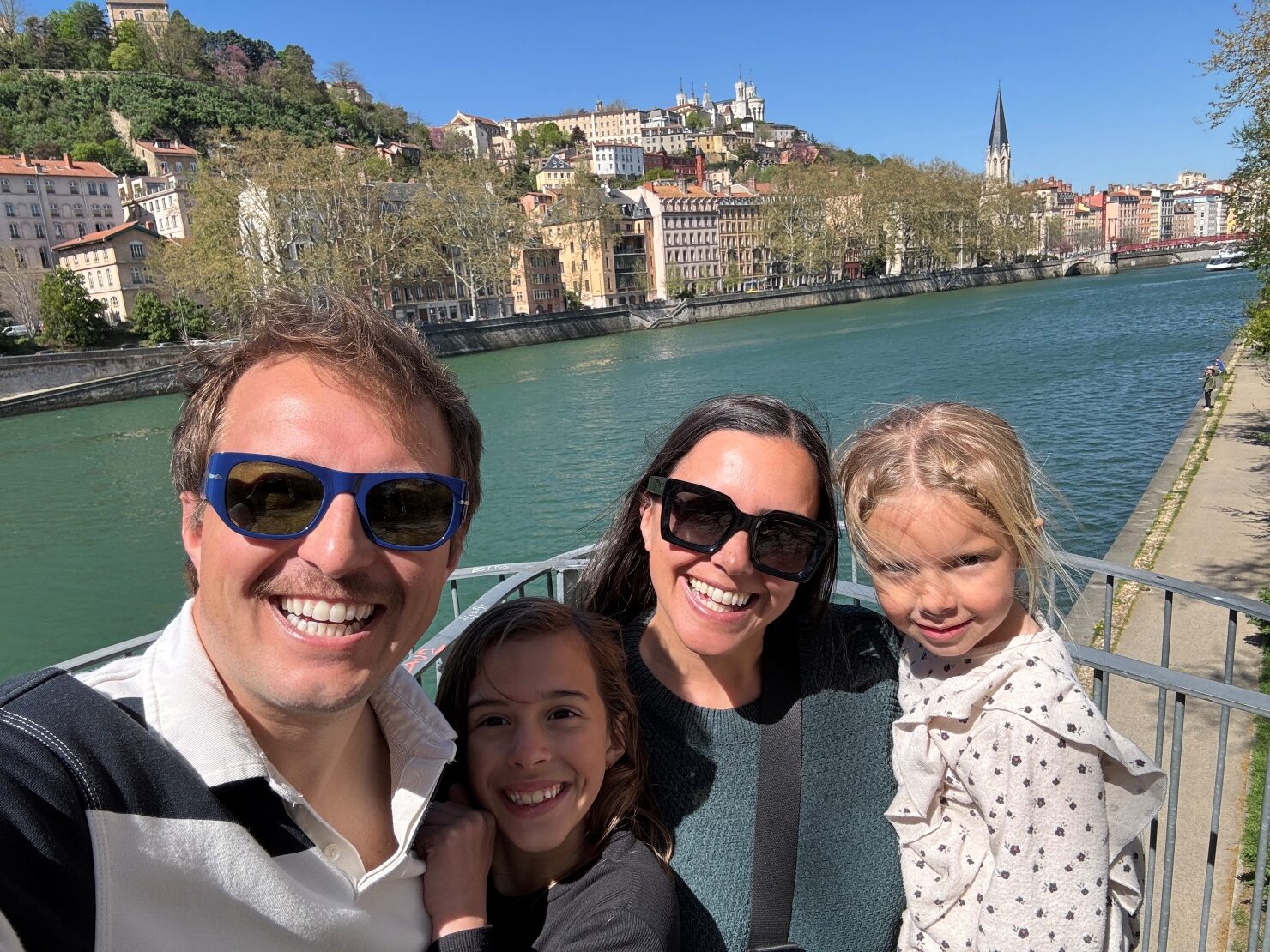 Walking along the Saone river in Lyon, France with kids